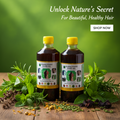 Two bottles of Harki Pinky Hair Oil with green leaves on a wooden surface and green background.