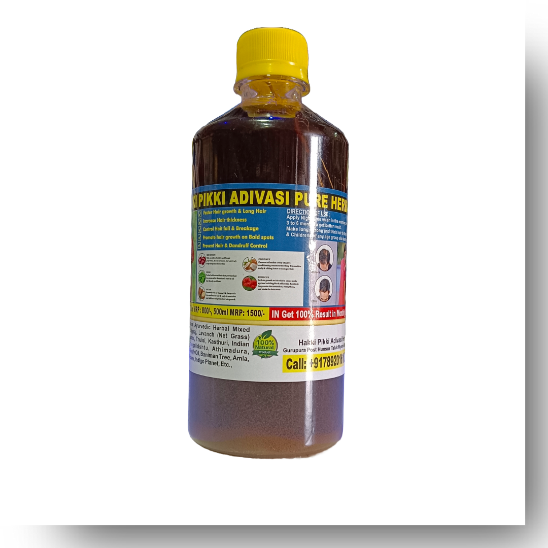 Hakki Pikki Herbal Oil Bottle of Pikki Adivasi Pure Herb with a yellow cap on a white background
